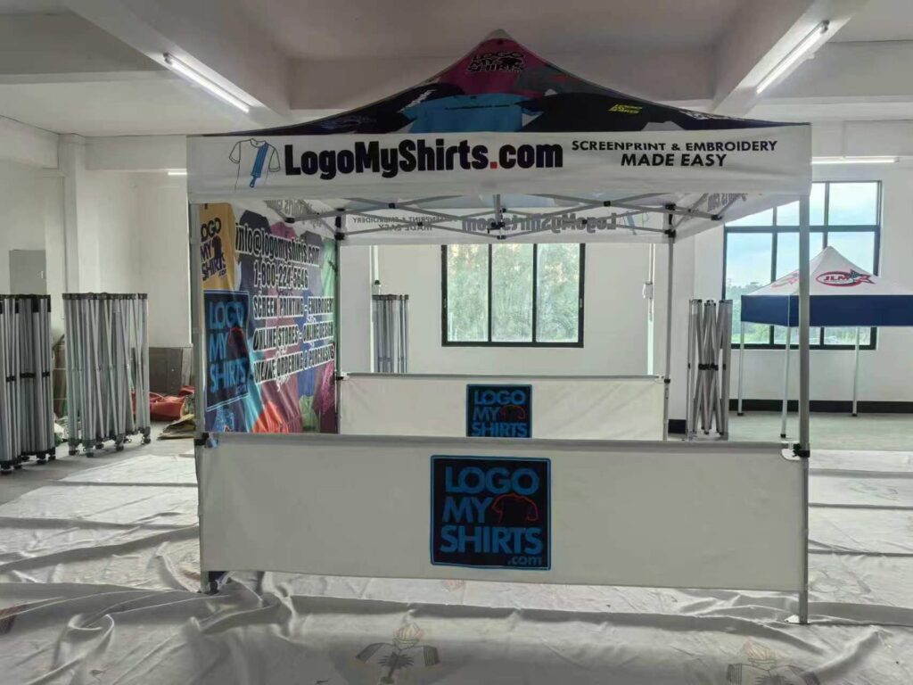 Branded canopy tent with half wall and logo