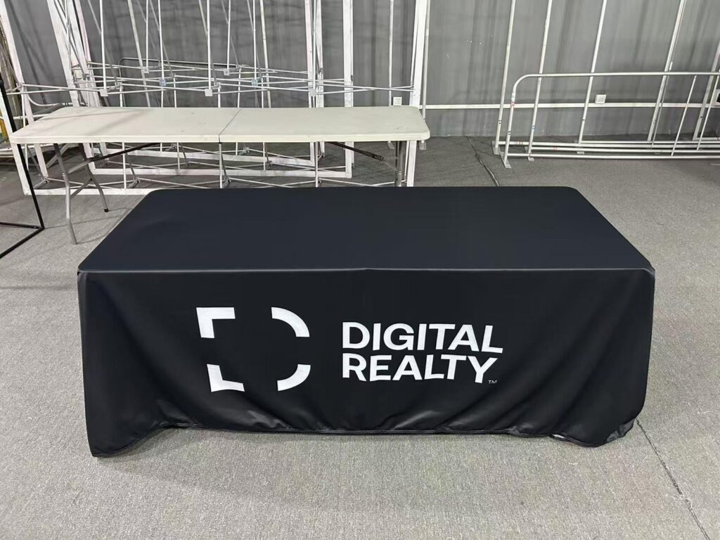 Black table cover with white logo