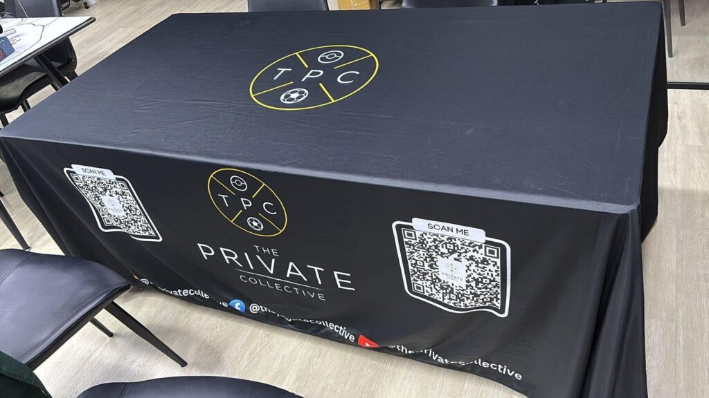 Black table cover with printed graphics